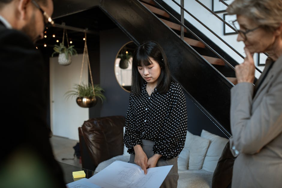 Professional team discussing project plans in a modern office environment