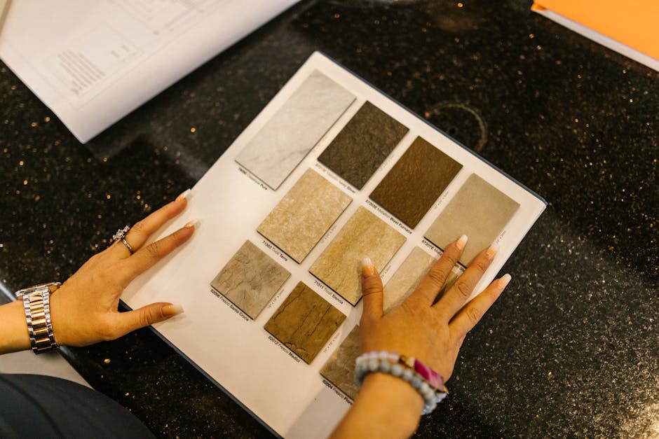 Businesswoman browsing stone samples in office for project evaluation
